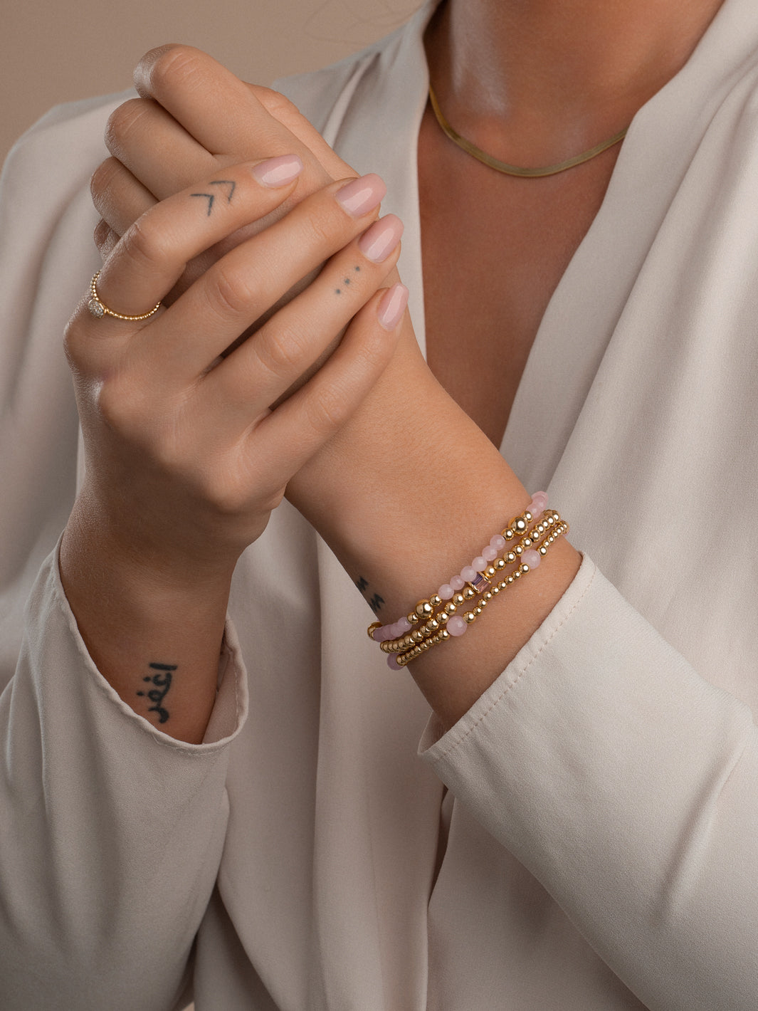 goudkleurige kralenarmband met edelsteen van Sparkling