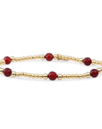 gouden sieraden met gekleurde 