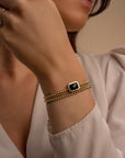 Onyx armband met goudkleurige kralen 